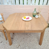 Table Art Déco restaurée, vue du dessus pour mettre en valeur la texture du bois.