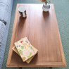 Table basse piètement noir fusain, vue du dessus pour apprécier les détails naturels du bois du plateau.